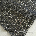 Tessuto in pizzo netto con paillettes francesi in poliestere in nylon